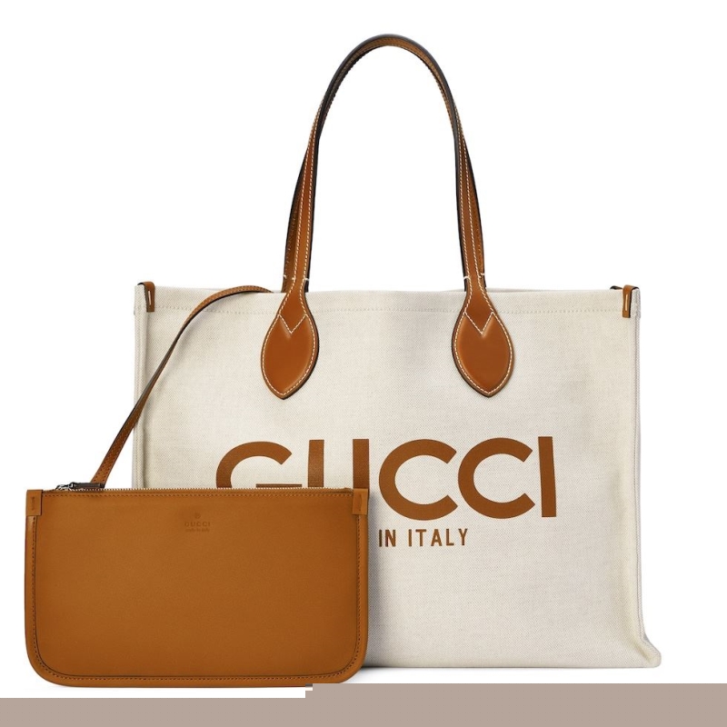 G*u*i shopping bags